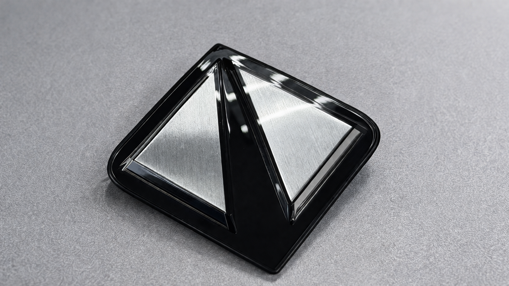 PVD coated emblem application